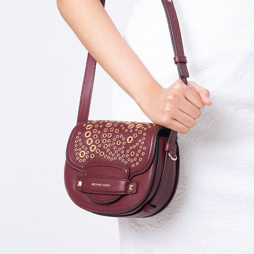 NWT MICHAEL MICHAEL KORS Cary Small Grommeted Leather Saddle Bag oxblood red